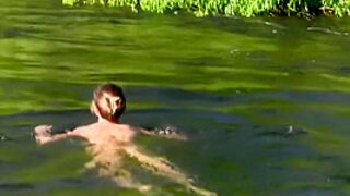 This woman enjoys to be nude in the river
