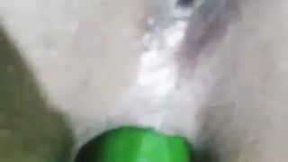 Sleazy Muslim hijab lady anal and vagina fucking with cucumber